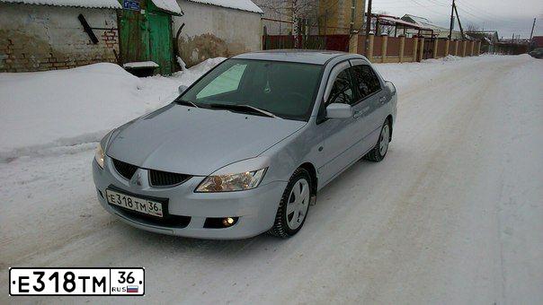 Фото автомобиля MITSUBISHI LANCER, 2004 — госномер К616ОР154. Цвет: Серебристый