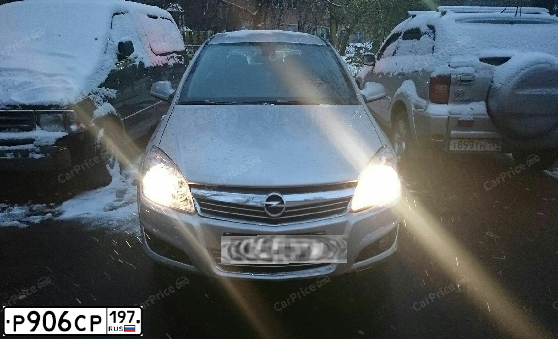 Фото автомобиля OPEL ASTRA, 2011 — госномер Р906СР197. Цвет: Серебристый