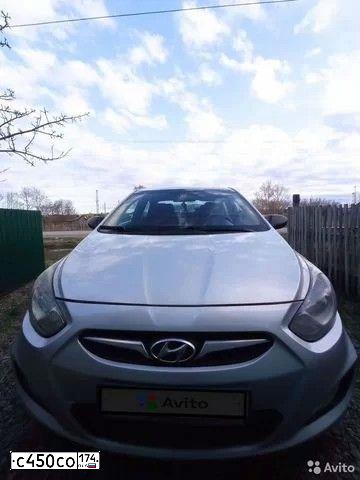 Фото автомобиля HYUNDAI SOLARIS, 2014 — госномер С450СО174. Цвет: Серебристый