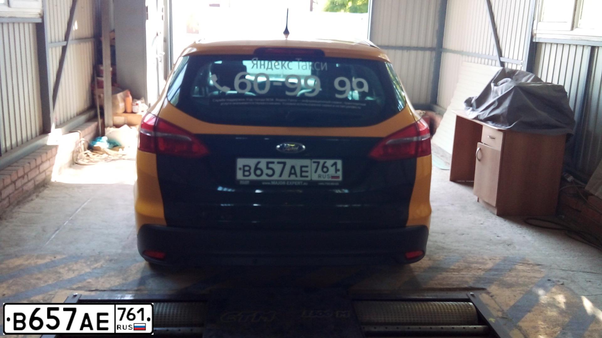 Фото автомобиля FORD D FOCUS, 2016 — госномер В657АЕ761. Цвет: ЖЕЛТЫЙ