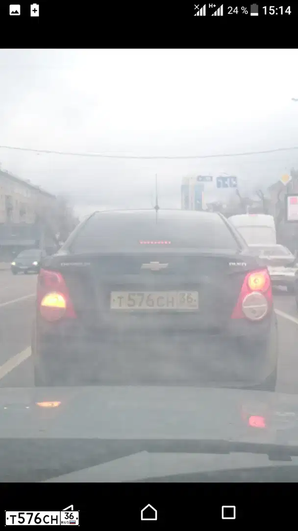 Фото автомобиля CHEVROLET AVEO, 2012 — госномер Т576СН36. Цвет: ЧЕРНЫЙ
