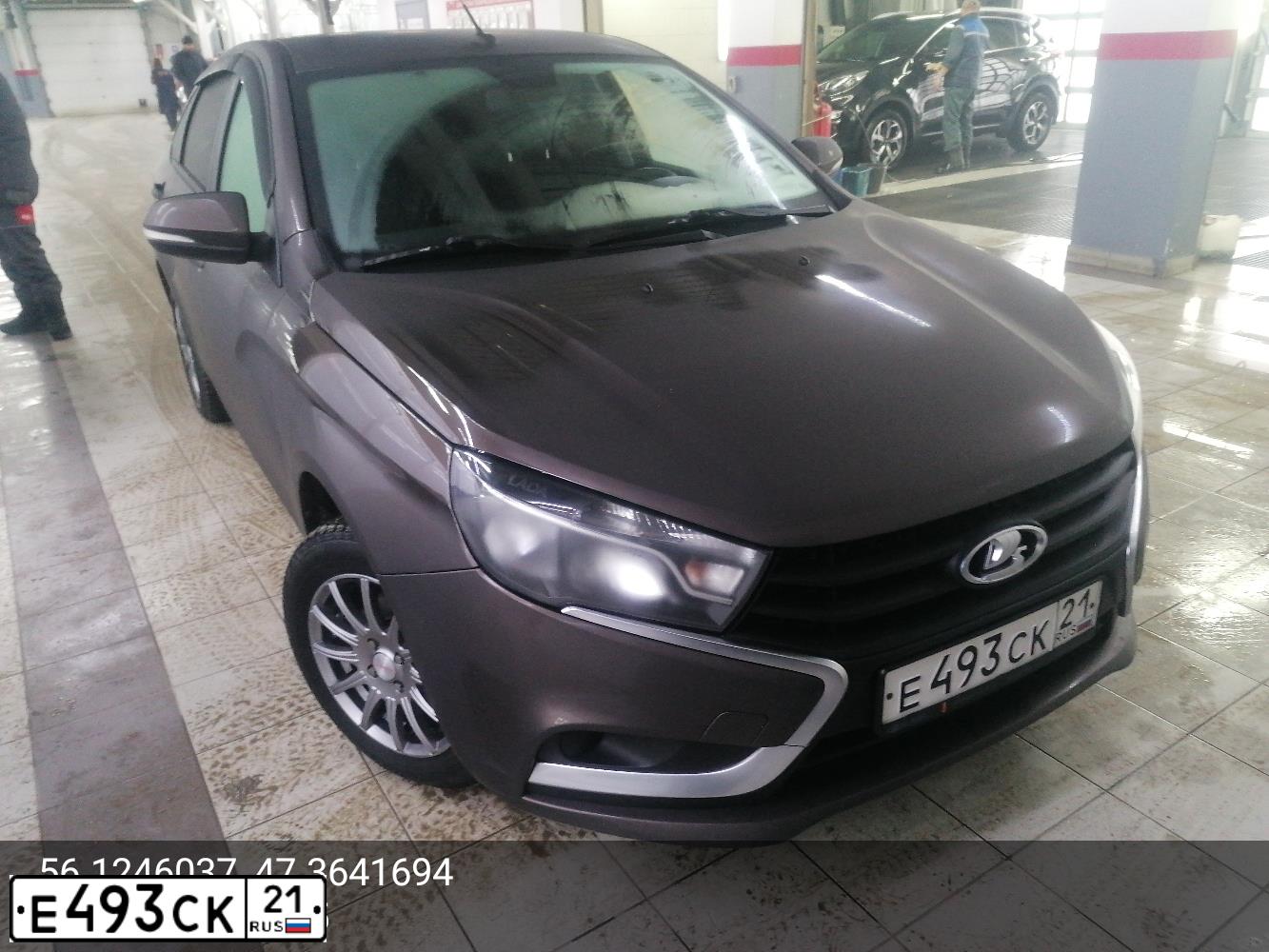Фото автомобиля LADA VESTA, 2016 — госномер Е493СК21. Цвет: Коричневый