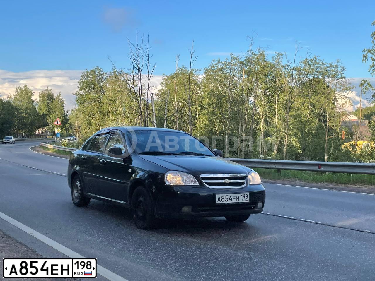 Фото автомобиля CHEVROLET LACETTI, 2012 — госномер С564РК198. Цвет: ЧЕРНЫЙ