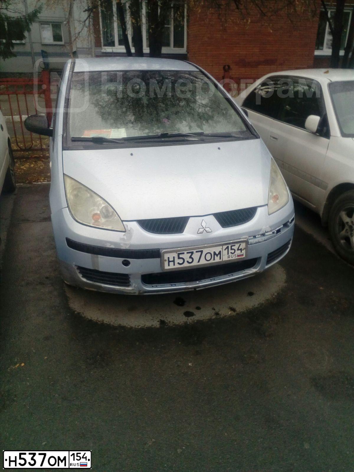 Фото автомобиля MITSUBISHI COLT, 2005 — госномер Н537ОМ154. Цвет: СВЕТЛО-ГОЛУБОЙ