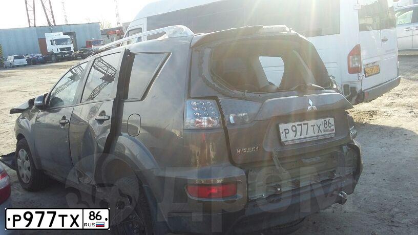 Фото автомобиля MITSUBISHI OUTLANDER, 2009 — госномер Р977ТХ86. Цвет: Коричневый