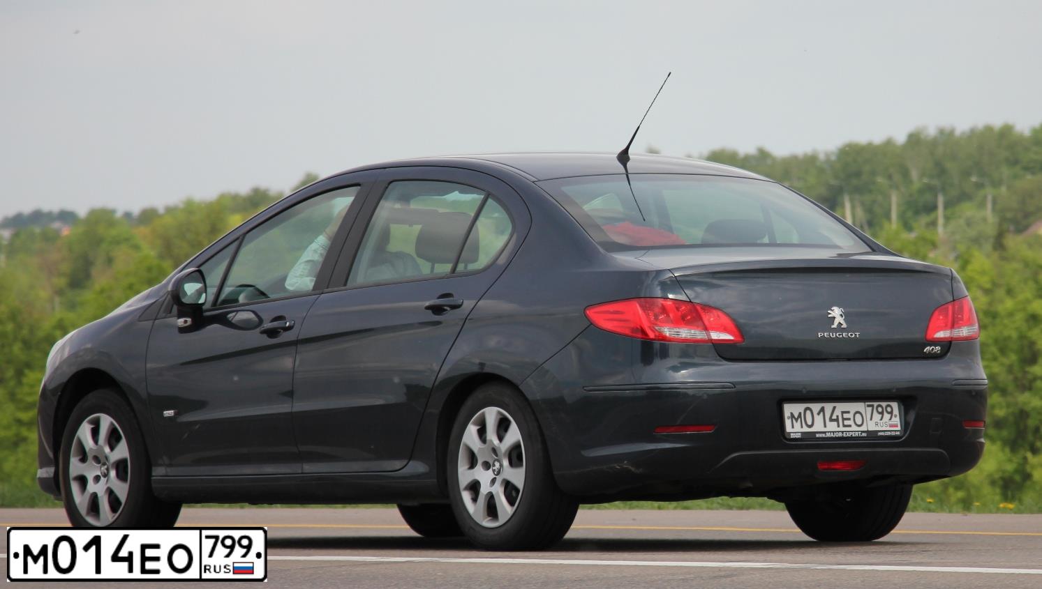 Фото автомобиля PEUGEOT 408, 2014 — госномер О941ЕВ134. Цвет: ТЕМНО-СИНИЙ