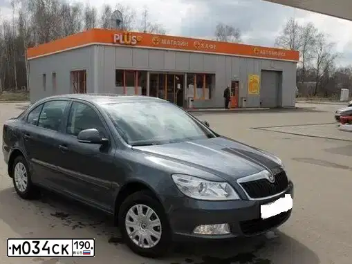 Фото автомобиля SKODA OCTAVIA, 2011 — госномер М034СК190. Цвет: СЕРЫЙ ТЕМНЫЙ