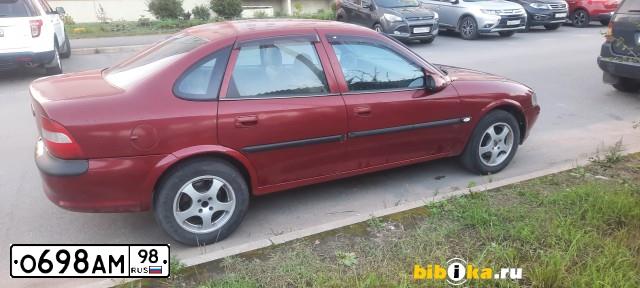 Фото автомобиля OPEL VECTRA, 1996 — госномер К408ОК53. Цвет: ВИШНЕВЫЙ
