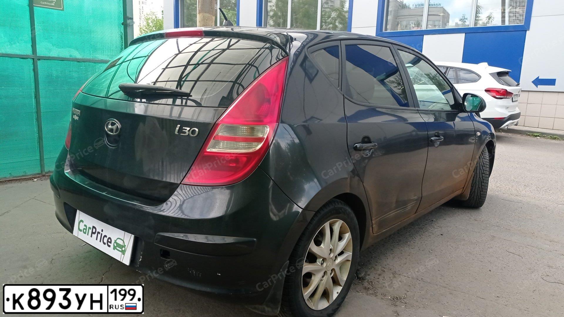 Фото автомобиля HYUNDAI I30, 2009 — госномер К893УН199. Цвет: ЧЕРНЫЙ