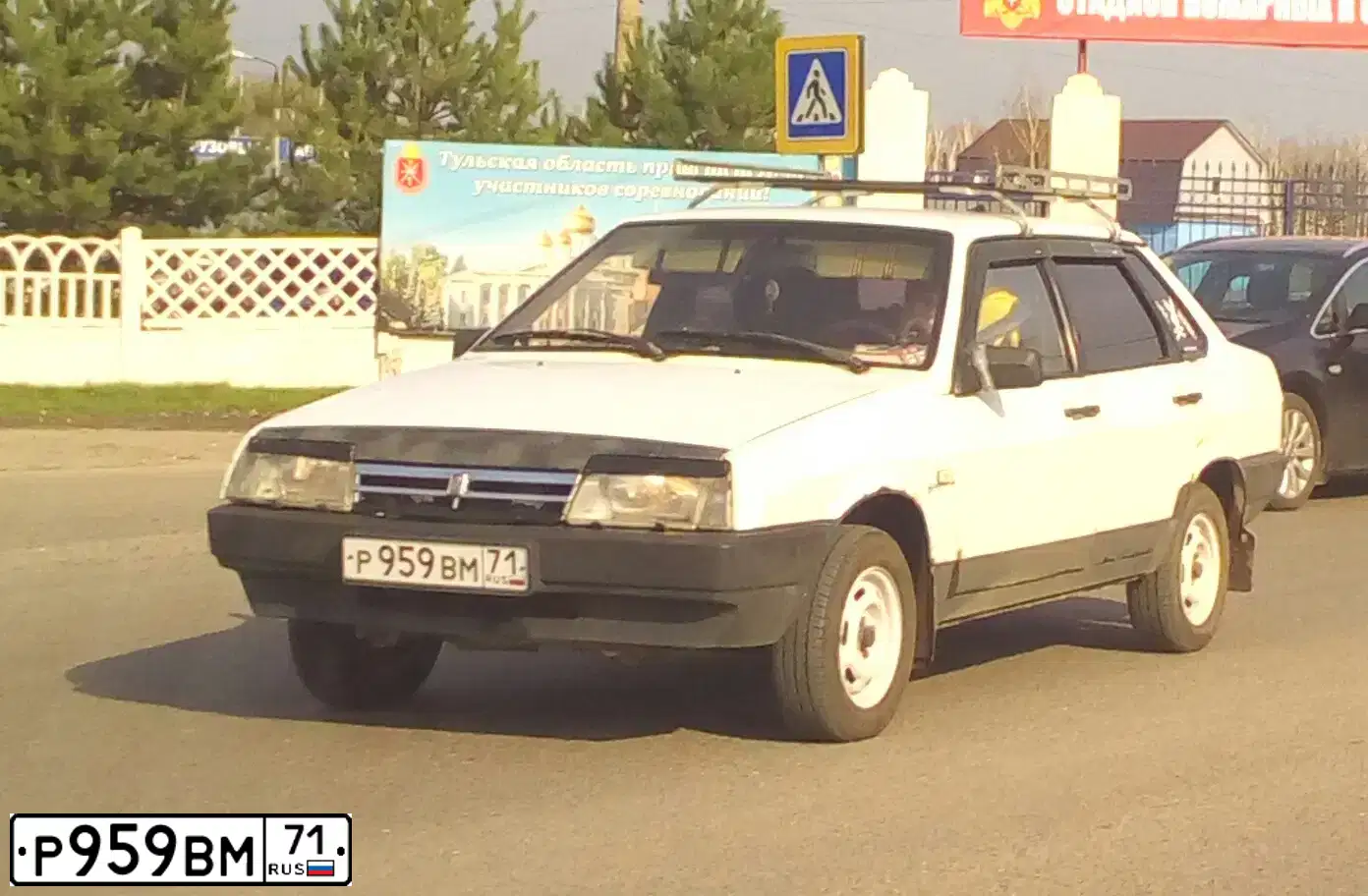 Фото автомобиля LADA VESTA, 2018 — госномер Р959ВМ71. Цвет: ЧЕРНЫЙ