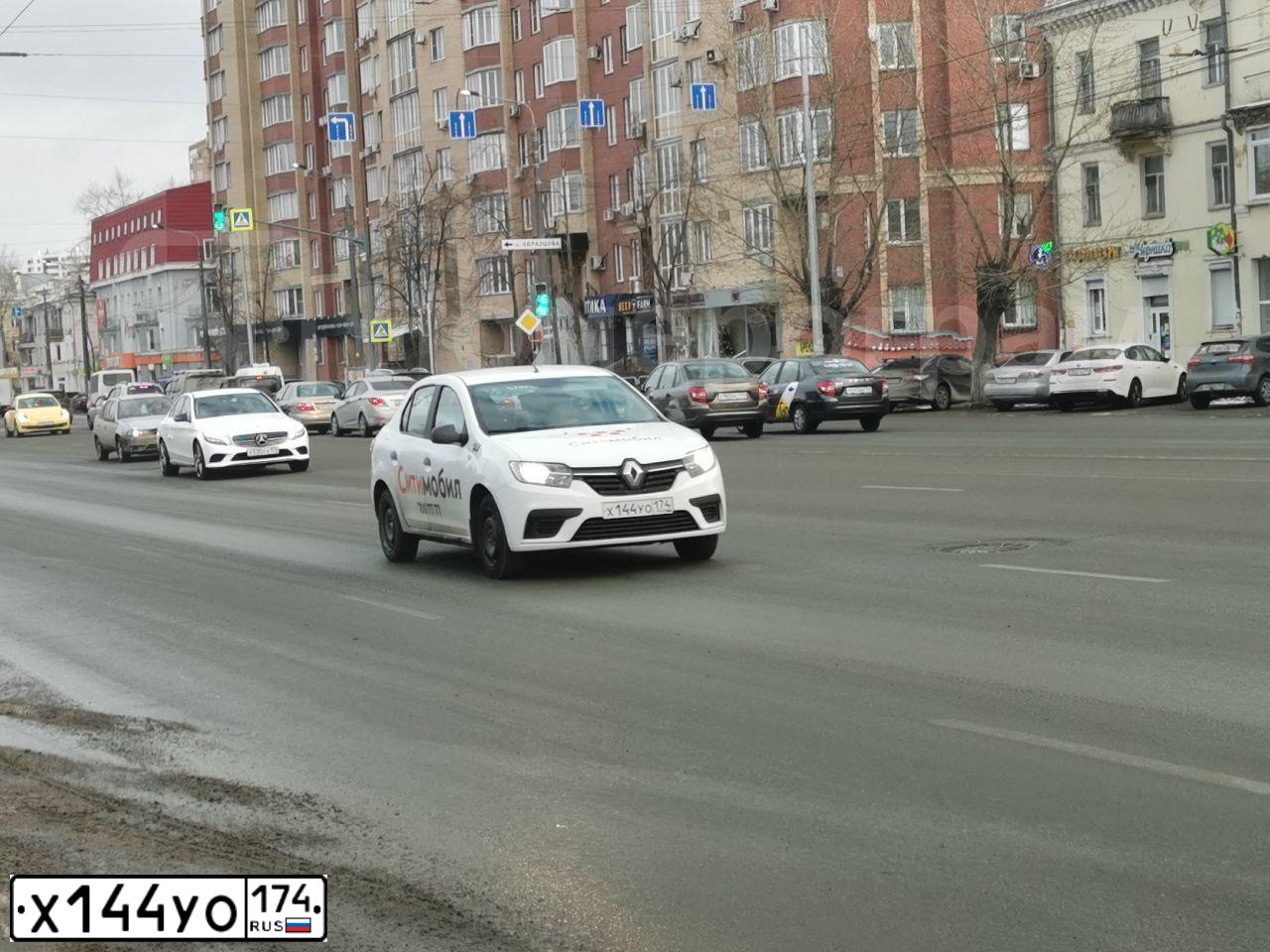Фото автомобиля RENAULT LOGAN, 2019 — госномер Х144УО174. Цвет: Белый
