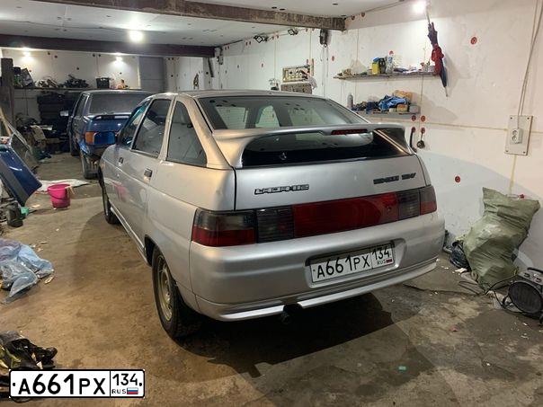 Фото автомобиля LADA 2112, 2004 — госномер А661РХ134. Цвет: СВЕТЛО-СЕРЕБРИСТЫЙ МЕТАЛЛ