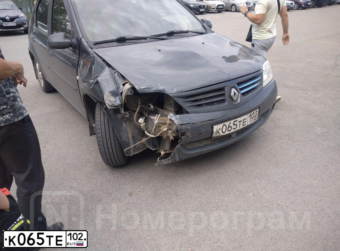 Фото автомобиля RENAULT LOGAN, 2008 — госномер К065ТЕ102. Цвет: ТЕМНО-СЕРЫЙ