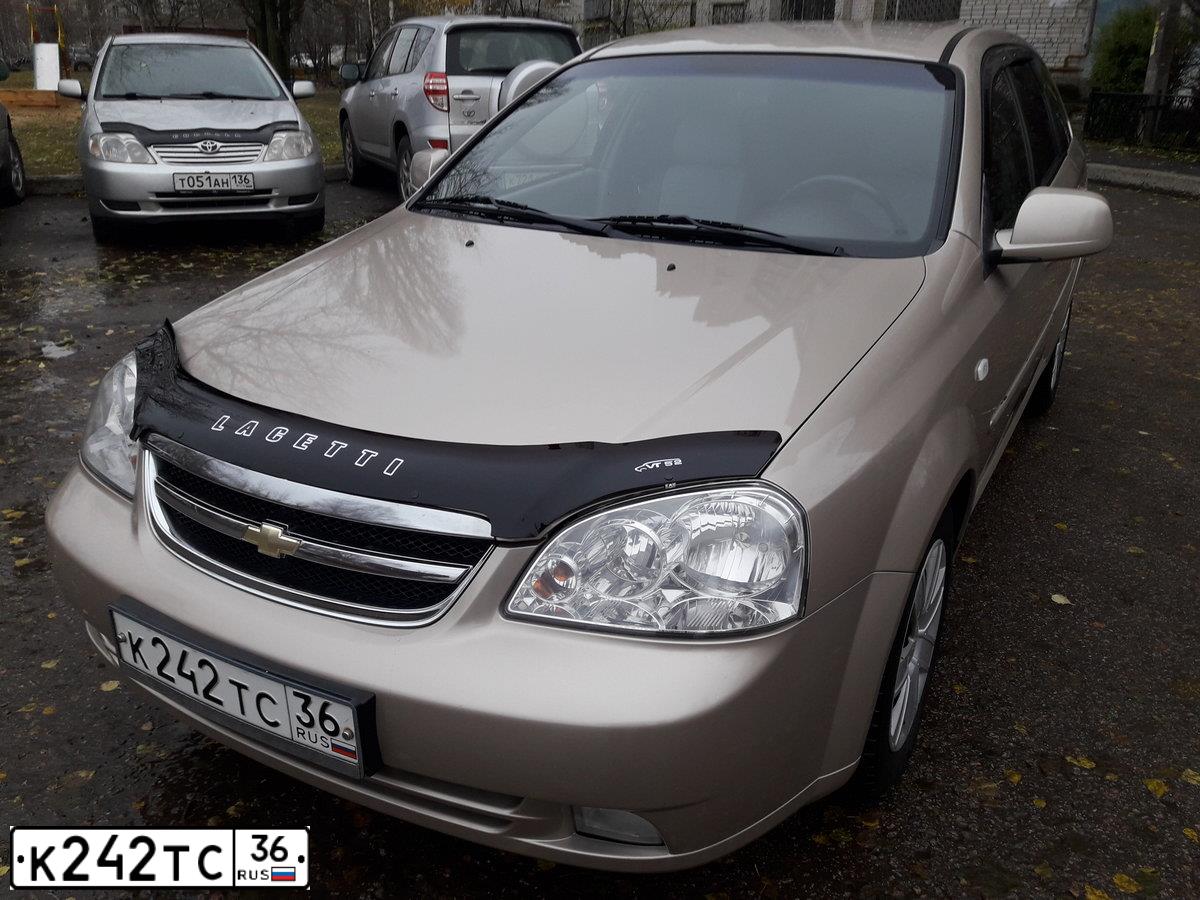 Фото автомобиля CHEVROLET LACETTI, 2011 — госномер К242ТС36. Цвет: БЕЖЕВЫЙ