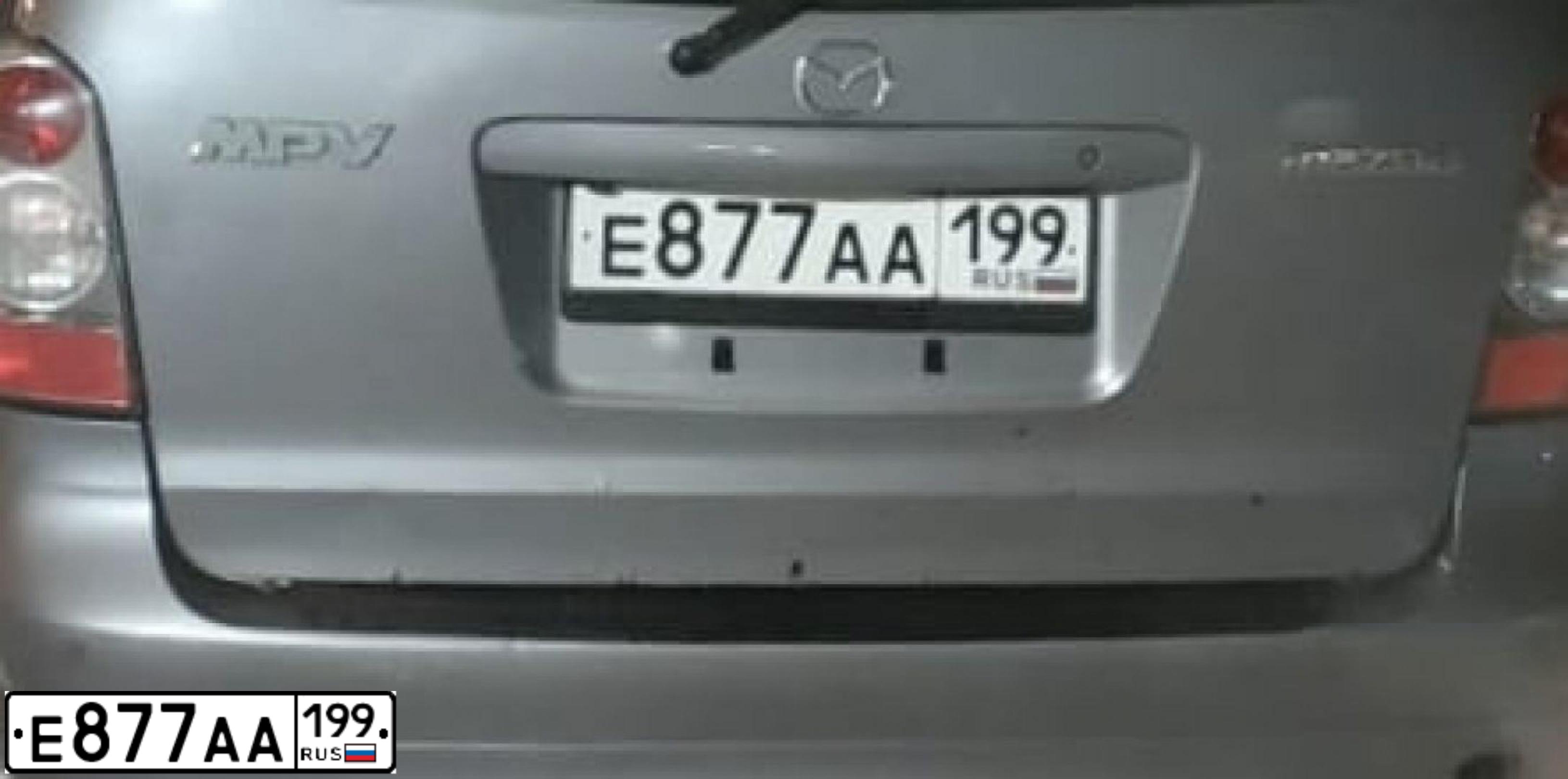 Фото автомобиля MAZDA MPV, 2003 — госномер Е877АА199. Цвет: Серый