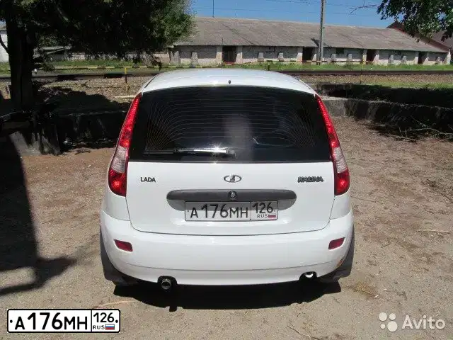 Фото автомобиля LADA 1119 KALINA, 2012 — госномер А176МН126. Цвет: БЕЛЫЙ