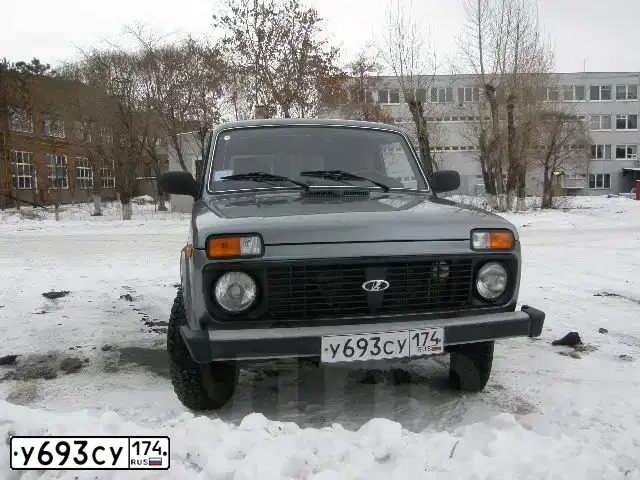 Фото автомобиля LADA 2131 NIVA, 2011 — госномер У693СУ174. Цвет: СЕРО-ЗЕЛЕНЫЙ
