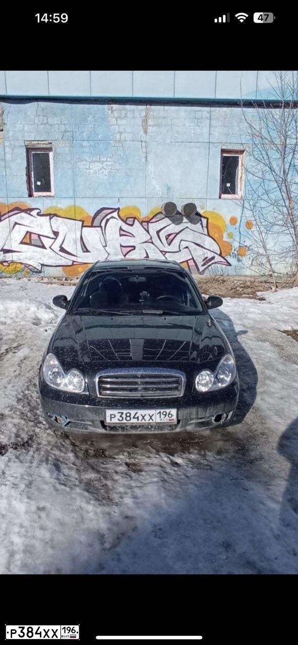 Фото автомобиля TAGAZ SONATA, 2009 — госномер Р384ХХ196. Цвет: ЧЕРНЫЙ