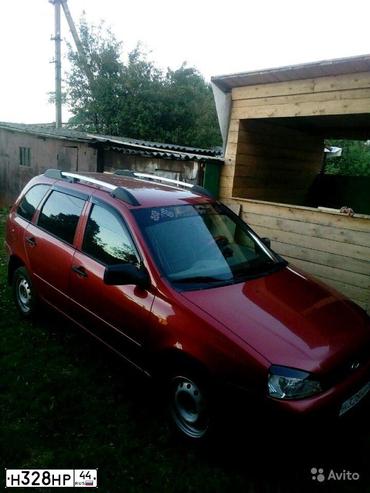 Фото автомобиля LADA 1117 KALINA, 2010 — госномер Н328НР44. Цвет: СИНЕ-ЧЕРНЫЙ