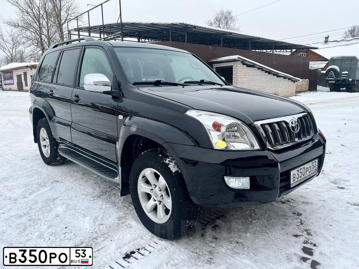 Фото автомобиля TOYOTA LAND CRUISER 150, 2008 — госномер Н038ХА702. Цвет: ЧЕРНЫЙ МЕТАЛЛИК