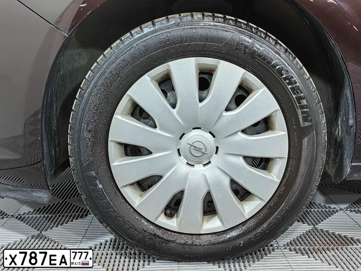 Фото автомобиля OPEL ASTRA, 2014 — госномер Х787ЕА777. Цвет: КОРИЧНЕВЫЙ