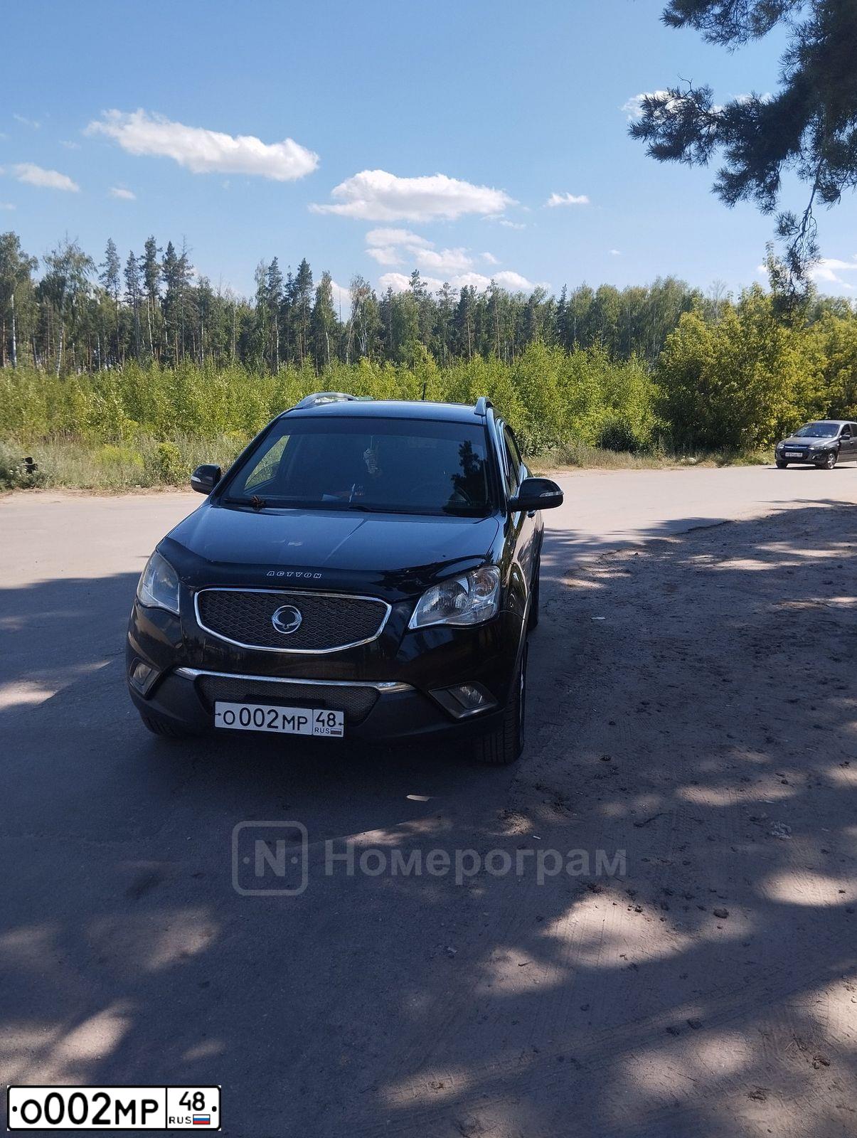 Фото автомобиля HYUNDAI GRANDEUR, 2007 — госномер Е011ЕА21. Цвет: СЕРЕБРИСТЫЙ