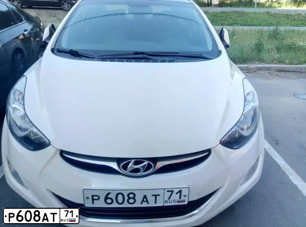 Фото автомобиля HYUNDAI AVANTE, 2012 — госномер М019СС750. Цвет: Белый