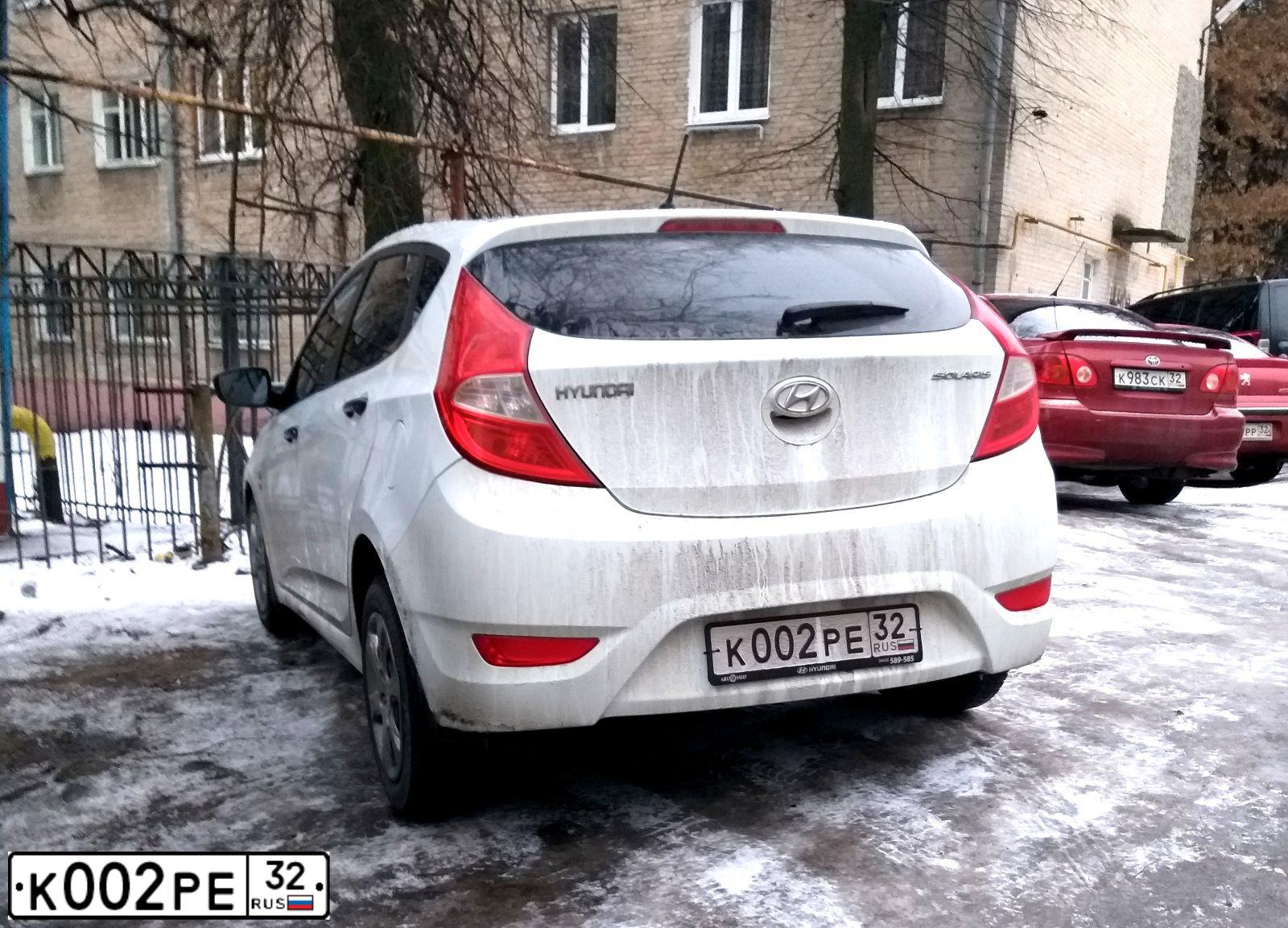 Фото автомобиля GAZ 3302 EL, 2010 — госномер К002РЕ32. Цвет: ТЕМНО-КРАСНЫЙ