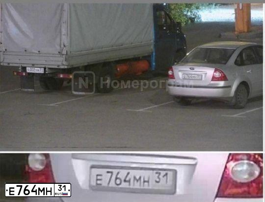 Фото автомобиля FORD FOCUS, 2005 — госномер Е764МН31. Цвет: СЕРЕБРИСТЫЙ