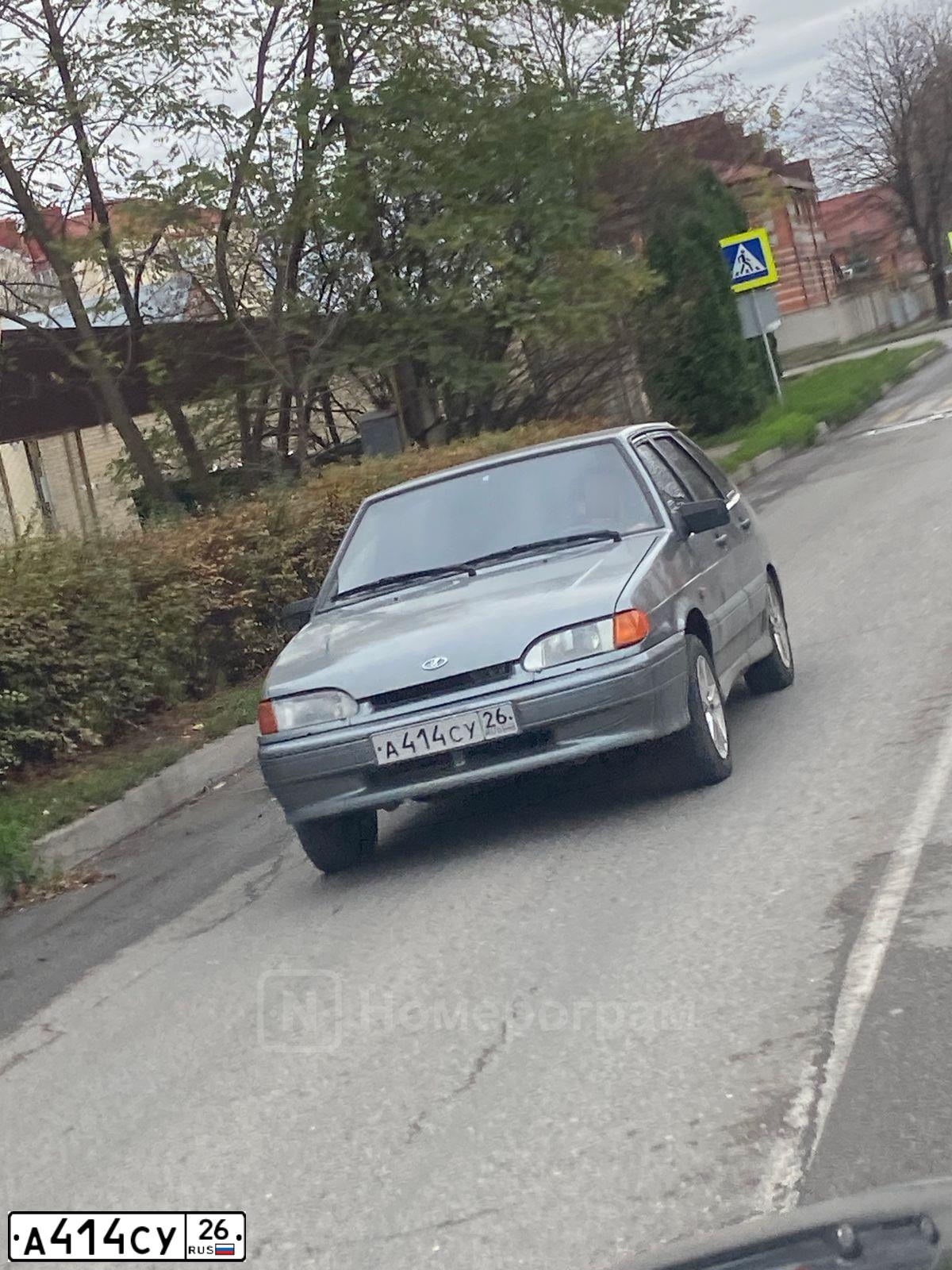 Фото автомобиля LADA 2114 SAMARA, 2005 — госномер А414СУ26. Цвет: СРЕДНИЙ СЕРО-ЗЕЛЕНЫЙ МЕТ