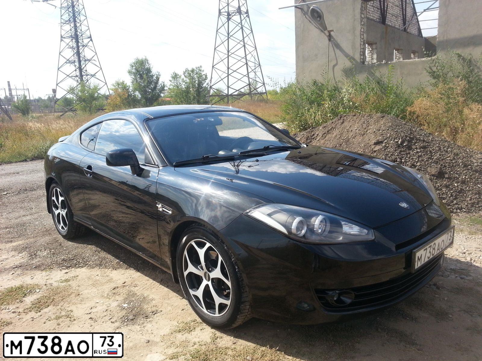 Фото автомобиля HYUNDAI /S-/COUPE / TUSCANI, 2007 — госномер К702ЕХ193. Цвет: ЧЕРНЫЙ