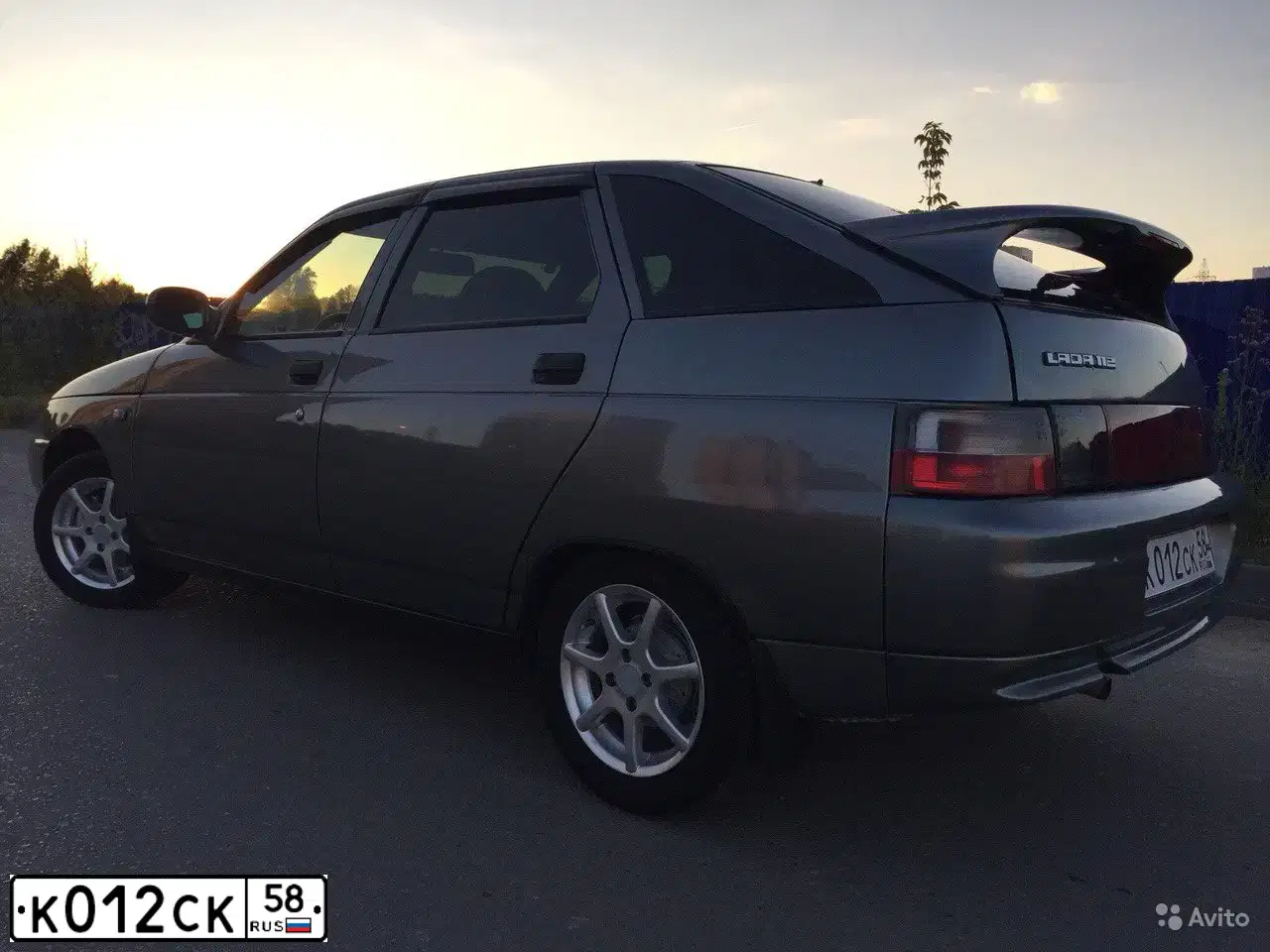 Фото автомобиля LADA 2112 LADA, 2008 — госномер К167КА164. Цвет: СРЕДНИЙ СЕРО-ЗЕЛЕНЫЙ МЕТ.