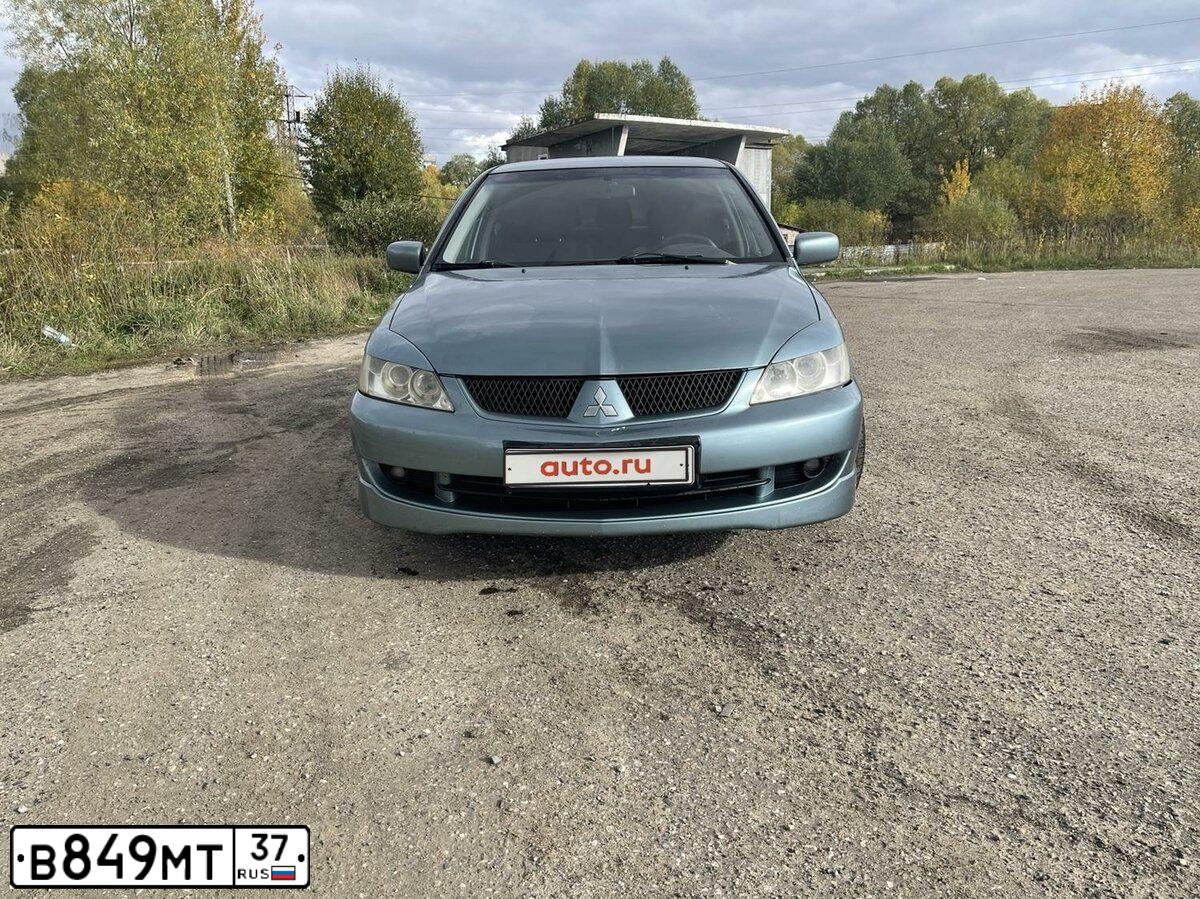Фото автомобиля MITSUBISHI LANCER, 2006 — госномер С211РВ716. Цвет: СВЕТЛО-СЕРО-ЗЕЛЕНЫЙ