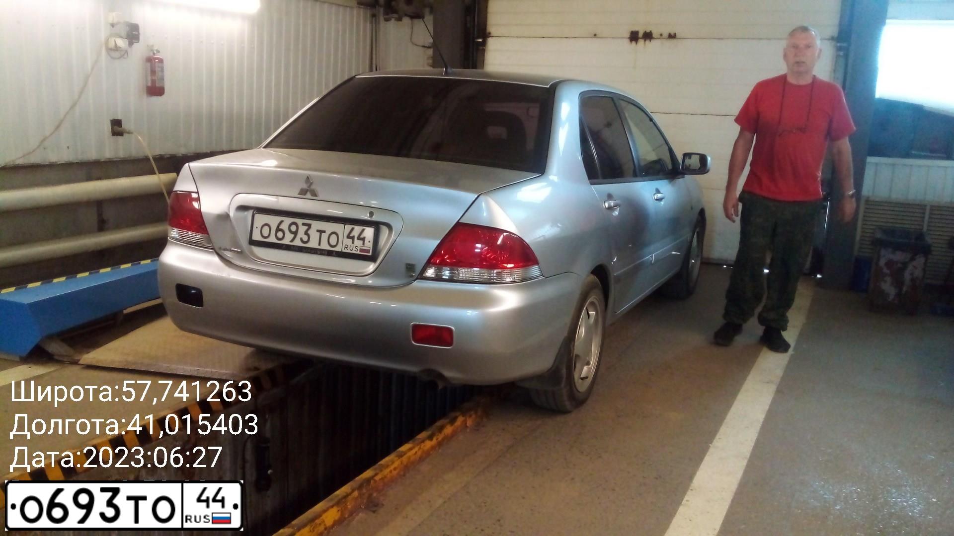Фото автомобиля MITSUBISHI LANCER, 2006 — госномер Е007ТА69. Цвет: СЕРЫЙ