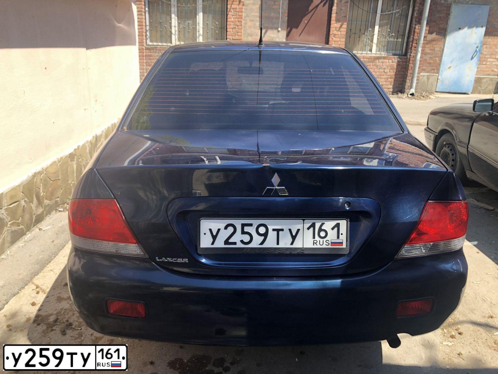 Фото автомобиля MITSUBISHI LANCER, 2006 — госномер У259ТУ161. Цвет: СИНИЙ