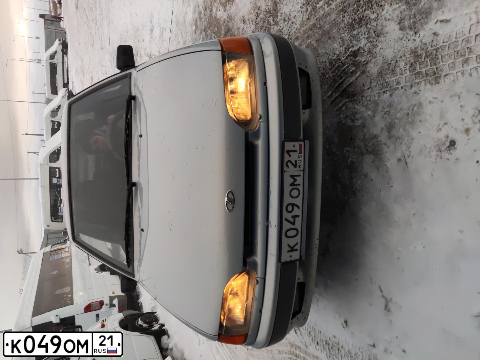 Фото автомобиля LADA 2115 SAMARA, 2007 — госномер К049ОМ21. Цвет: Серебристо-желто-голубой