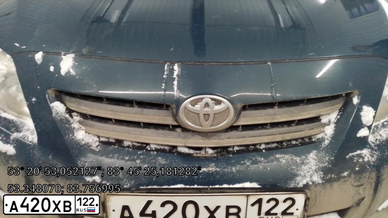 Фото автомобиля TOYOTA COROLLA, 2007 — госномер Е921РУ177. Цвет: Темно-синий