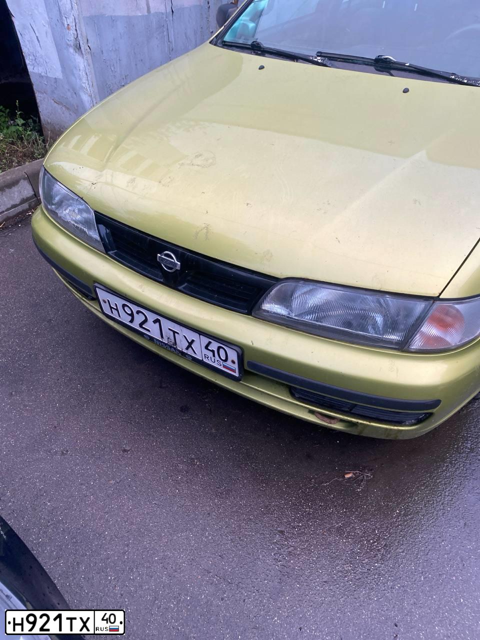 Фото автомобиля NISSAN ALMERA, 1998 — госномер Х130УВ77. Цвет: ЖЕЛТЫЙ