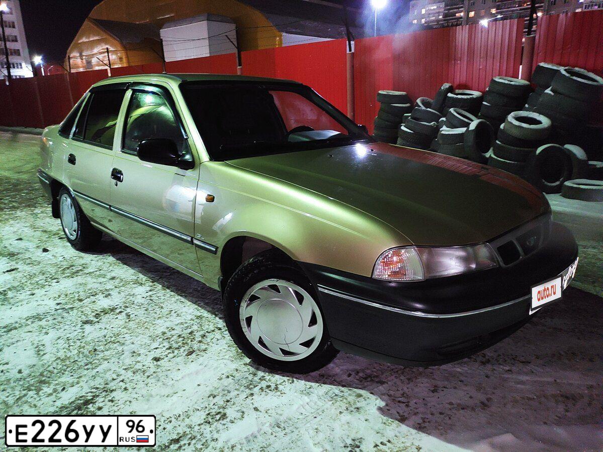 Фото автомобиля DAEWOO NEXIA, 2007 — госномер Е226УУ96. Цвет: БЕЖЕВЫЙ
