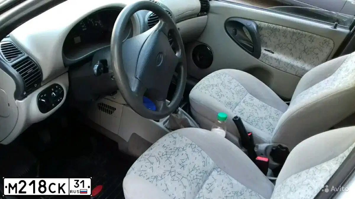 Фото автомобиля LADA 1118 KALINA, 2008 — госномер М218СК31. Цвет: Серебристый
