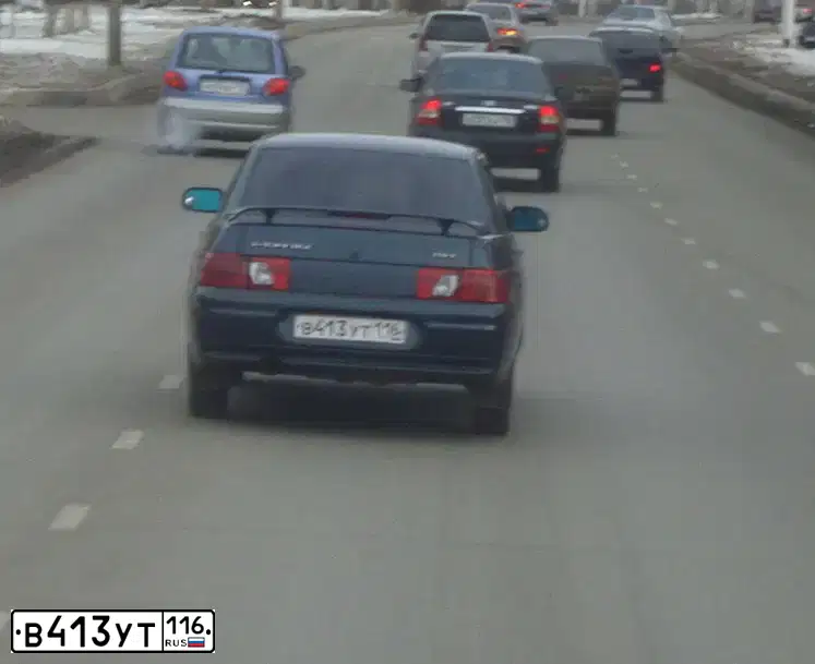 Фото автомобиля LADA 2110, 2007 — госномер О975ХТ716. Цвет: Темно-зеленый