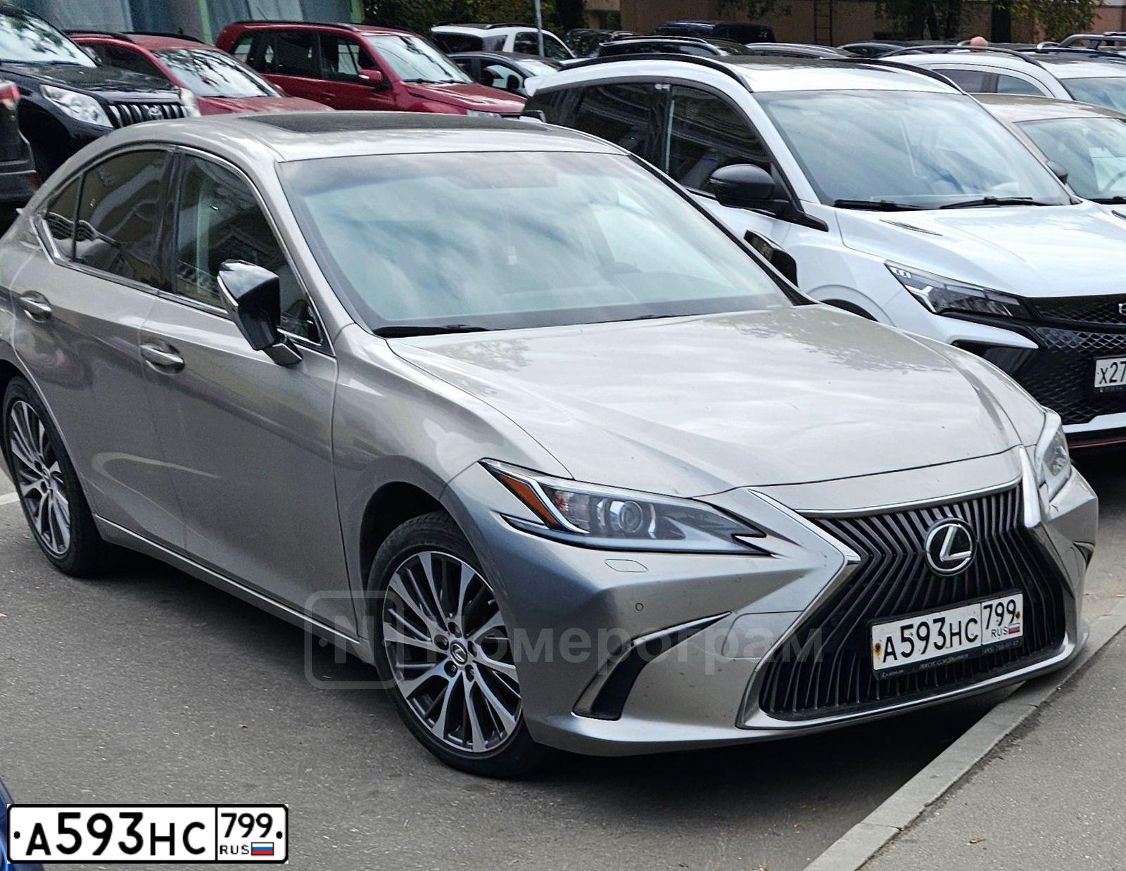 Фото автомобиля LEXUS ES, 2018 — госномер А593НС799. Цвет: СЕРЫЙ