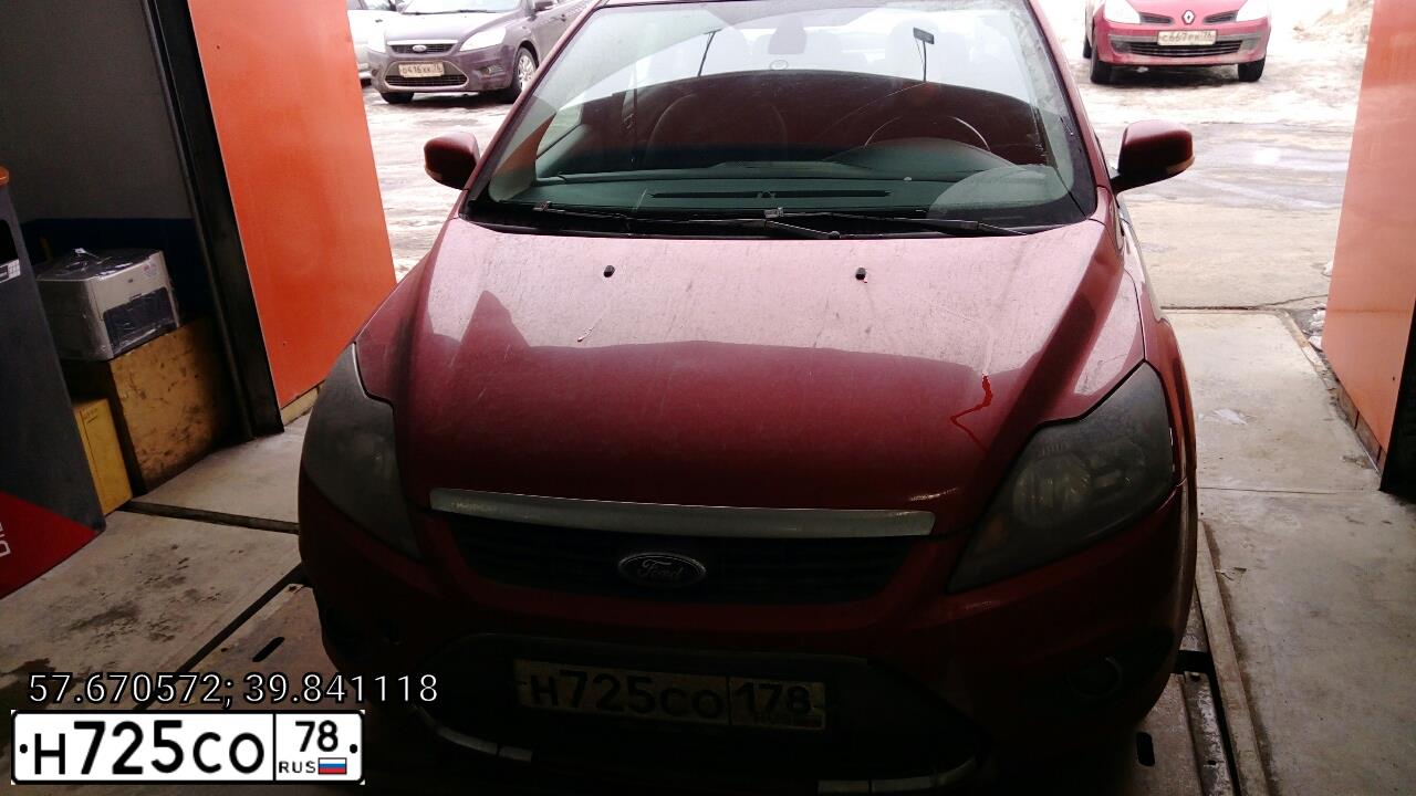 Фото автомобиля FORD FOCUS, 2009 — госномер Н725СО178. Цвет: Красно-оранжевый