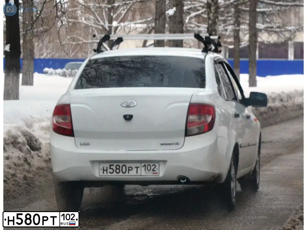 Фото автомобиля LADA 2190 GRANTA, 2012 — госномер Н580РТ102. Цвет: Белый