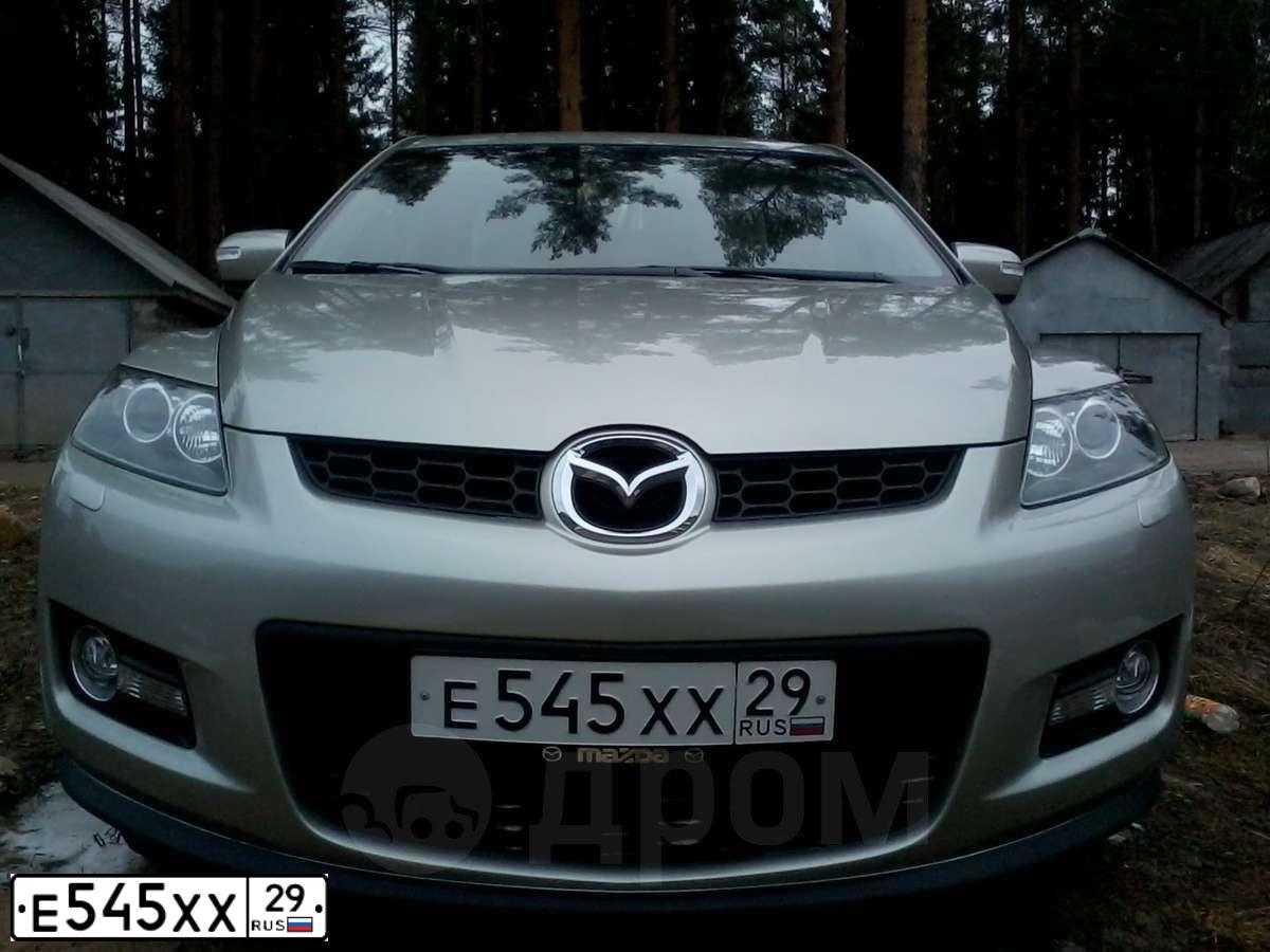 Фото автомобиля MAZDA CX-7, 2008 — госномер Н818КН29. Цвет: СЕРЫЙ