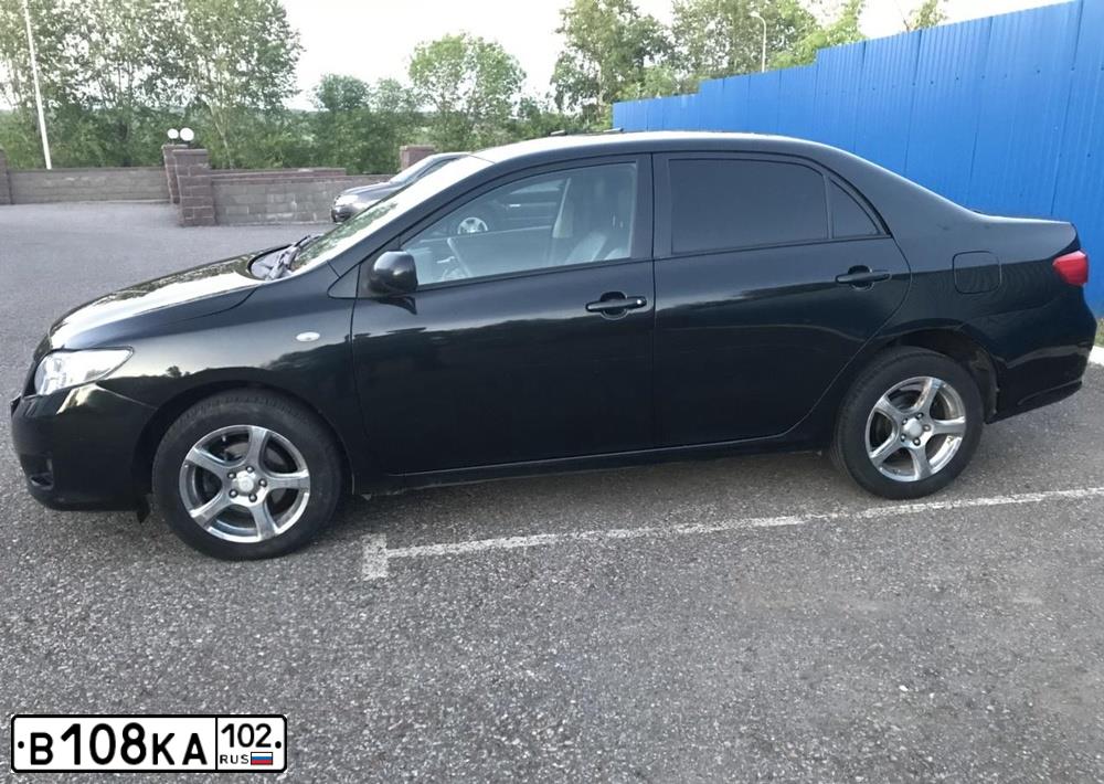 Фото автомобиля TOYOTA COROLLA, 2007 — госномер Н707НВ02. Цвет: ЧЕРНЫЙ