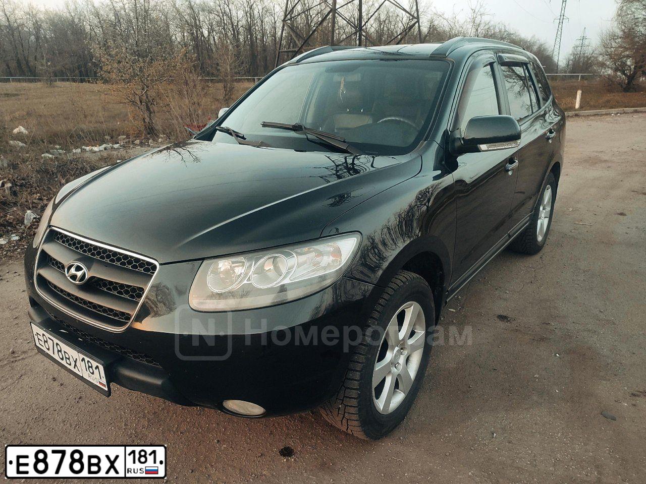 Фото автомобиля HYUNDAI SANTA FE, 2008 — госномер Е878ВХ181. Цвет: ЧЕРНЫЙ