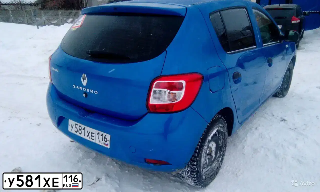 Фото автомобиля RENAULT T SANDERO, 2015 — госномер К955МЕ21. Цвет: СВЕТЛО-СИНИЙ