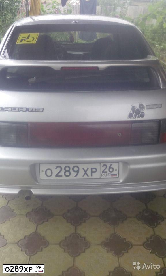 Фото автомобиля LADA 2112, 2004 — госномер О289ХР26. Цвет: СЕРЕБРИСТЫЙ