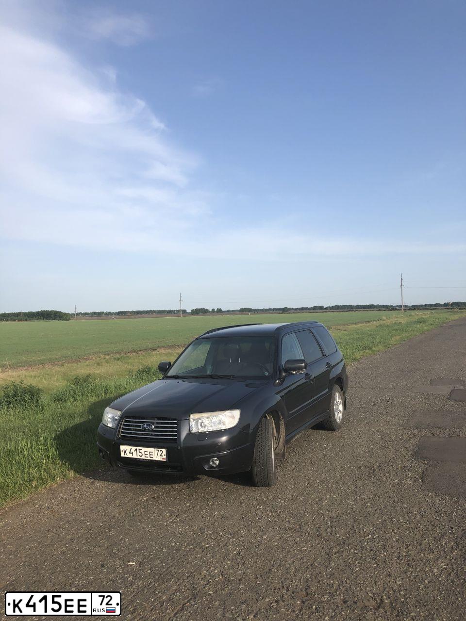 Фото автомобиля SUBARU FORESTER, 2007 — госномер К309ОР154. Цвет: СЕРЫЙ